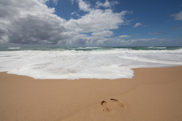 Fußabdrücke am Strand