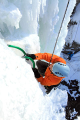 Ice climbing the waterfall.