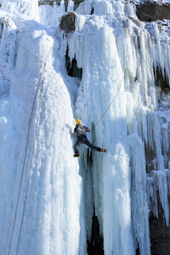 Ice climbing the waterfall.