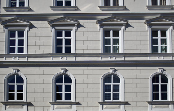 Windows on old style building facade