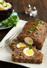 Sliced meatloaf with egg