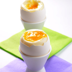 Breakfast of boiled egg in white  cup