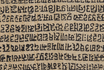 Close-up of text on handmade paper