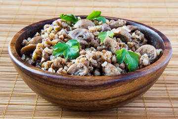 Russian traditional buckwheat with mushrooms and parsley