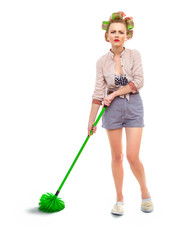 Funny angry or unhappy housewife / girl with broom