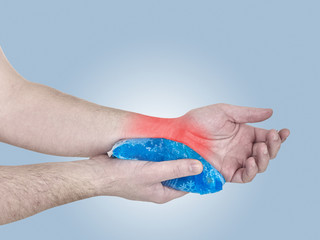 Cool gel pack on a swollen hurting wrist.