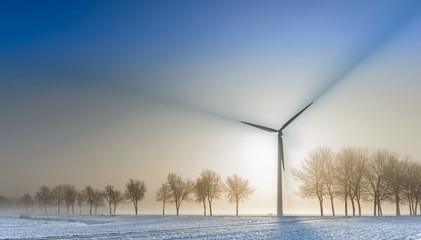 Spectacular beams of shadow from a wind turbine © Rene Hartmann