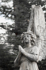 Fototapeta na wymiar Figure Of A Praying Angel