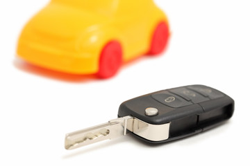 Auto remote control key and car (isolated)