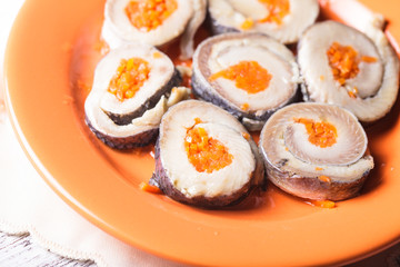 Herring rolls with carrot