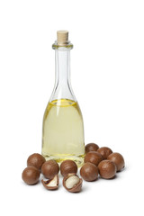 Bottle with Macadamia oil and nuts