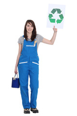 Fototapeta premium Painter holding recycling logo