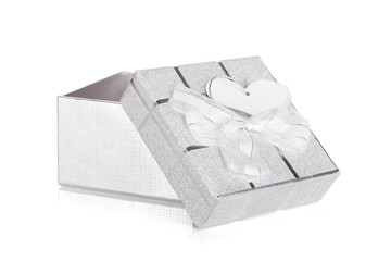 Silver gift box with bow and heart label