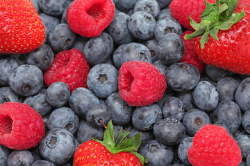 Strawberry,  blueberry and raspberry. Background