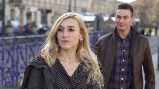 Happy couple meeting in the city, slow motion, shot at 240fps