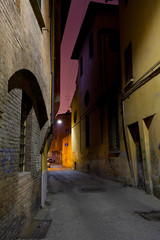 Obraz premium medieval street in Bologna at night
