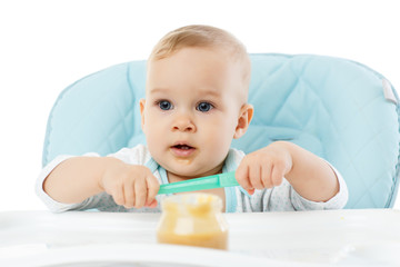 Sweet baby with spoon.