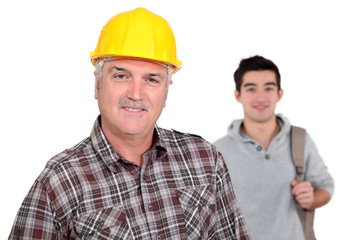 mature craftsman with apprentice