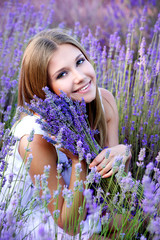 Beautiful girl on the lavender field