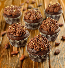 Chocolate cupcakes on a brown table