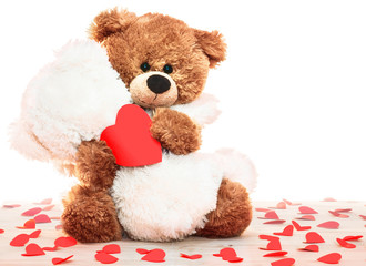 holding a heart in paws bear hugs another bear