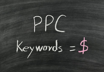 Obraz premium PPC,pay per click written on blackboard