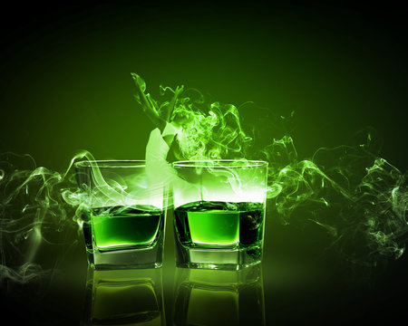Two glasses of green absinth