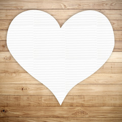 heart texture note paper on brown wood plank background