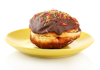 Tasty donut on color plate isolated on white