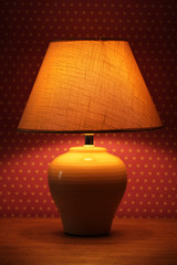 table lamp on wallpaper background.