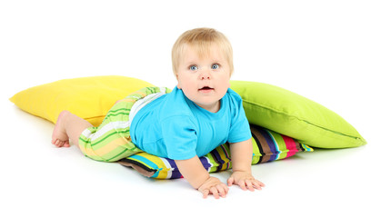 Little boy and color pillows, isolated on white