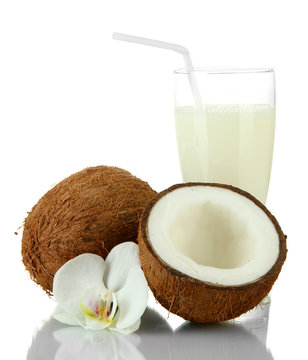 Coconuts with glass of milk, isolated on white