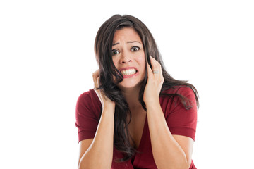 Frightened Hispanic woman portrait isolated on white