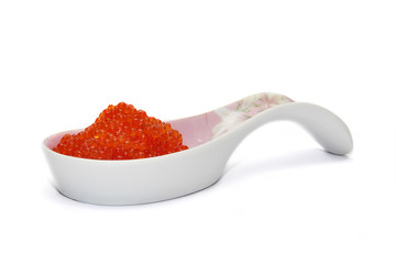 Red caviar spoon on the white background
