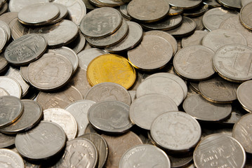 Gold coin around silver coin