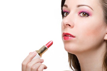 Fototapeta premium Applying lipstick