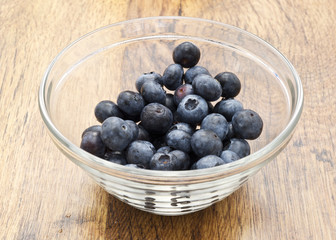 a glass cup of blueberries