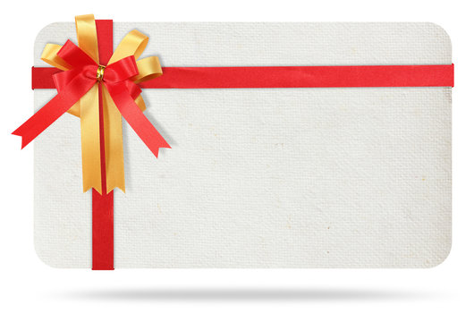 Blank gift card tied with a bow of red ribbon. Isolated on white