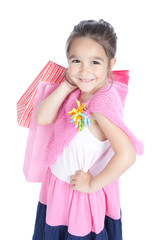 Happy little girl with shopping bags over white