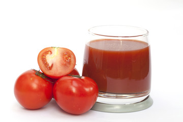Tomato and juice on the white background