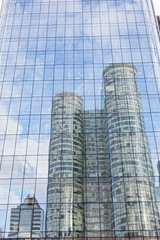 Reflection of modern buildings