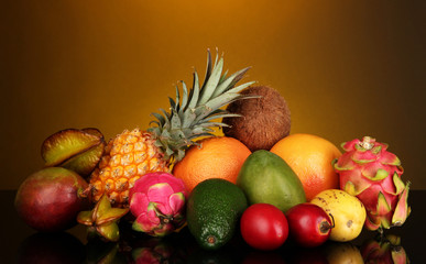 Composition of exotic fruits on colorful background