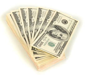 Many of one hundred dollars banknotes close-up isolated on