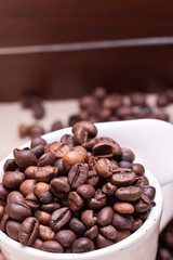 cup of coffee on a background coffee beans