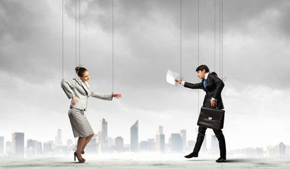 Puppet businesspeople
