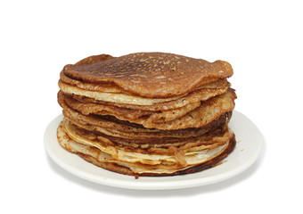 Стопка блинов на тарелке