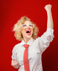 Winning success woman happy ecstatic celebrating being a winner