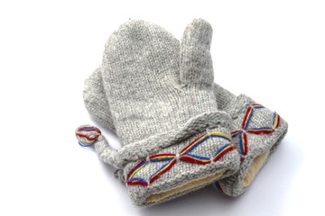 Warm woolen gloves isolated on white 