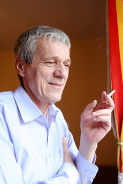 Older Man Smoking