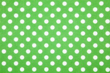 Green polka dot felt background